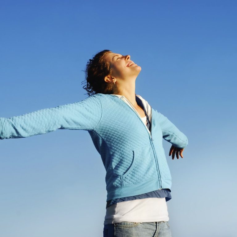 Photo of a happy woman, warm sunny day, freedom